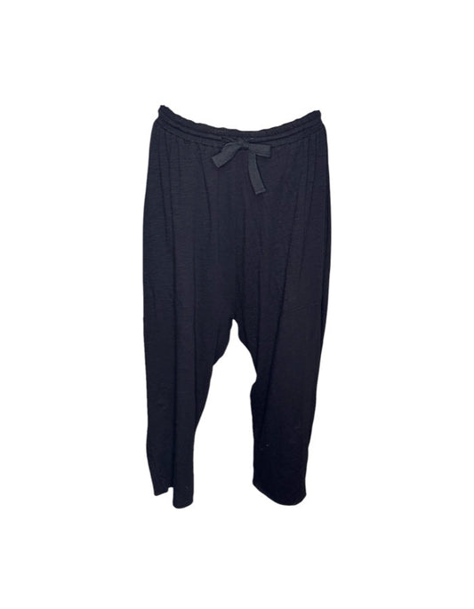 Black baggy pants on a white background